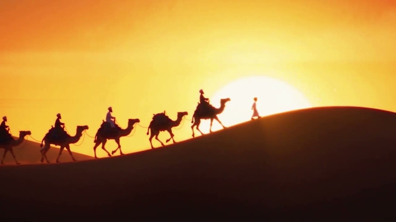 06. لقطة واسعة. غروب. القافلة تعبر الكثيب ظلالاً.